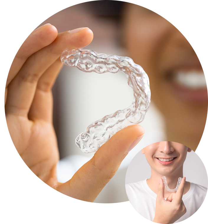 Close Up Of Woman Holding Clear Aligner