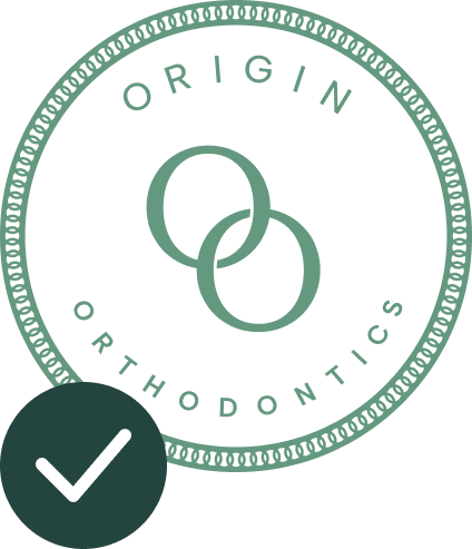 Origin Orthodontics Logo With Green Check Mark