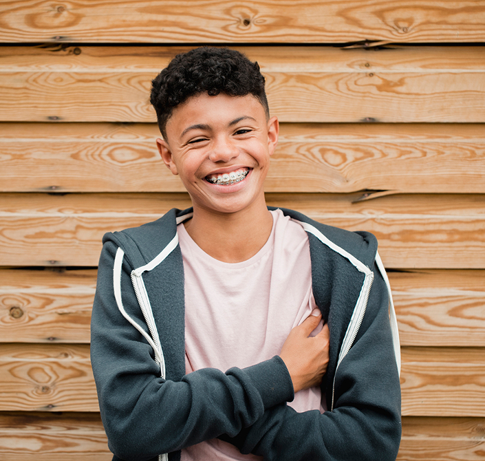 Smiling Teen Boy Wearing Braces