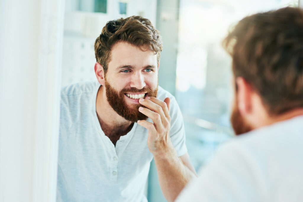 Man Self Examining This Teeth 1