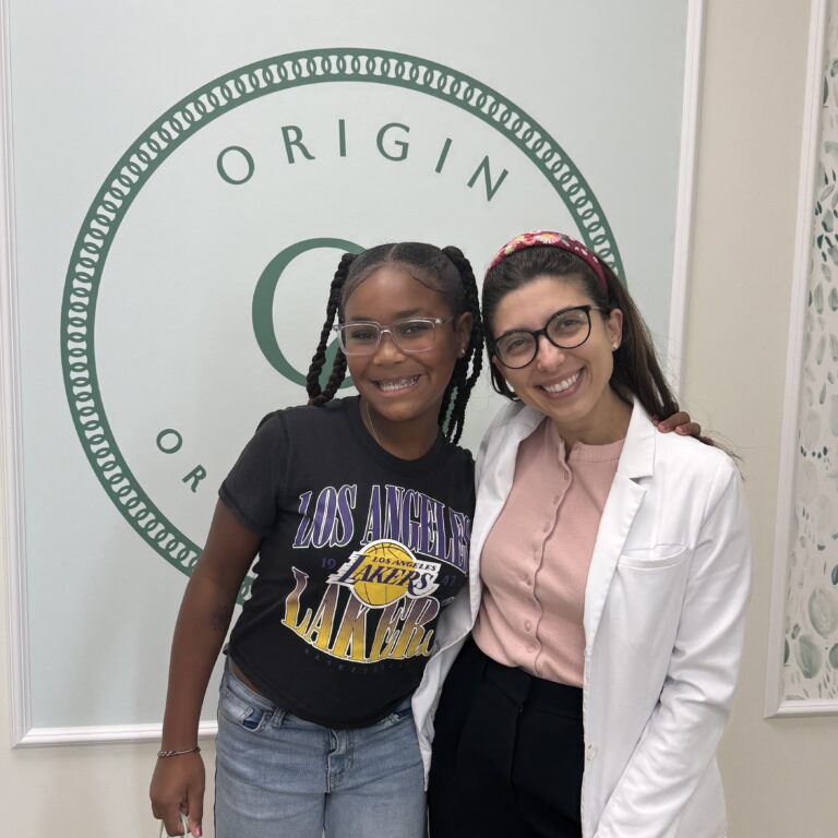 Dr Ioanna Ulrich With A Girl Patient With Braces