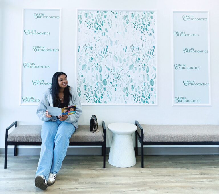 Happy Patient At Origin Orthodontics Waiting Room