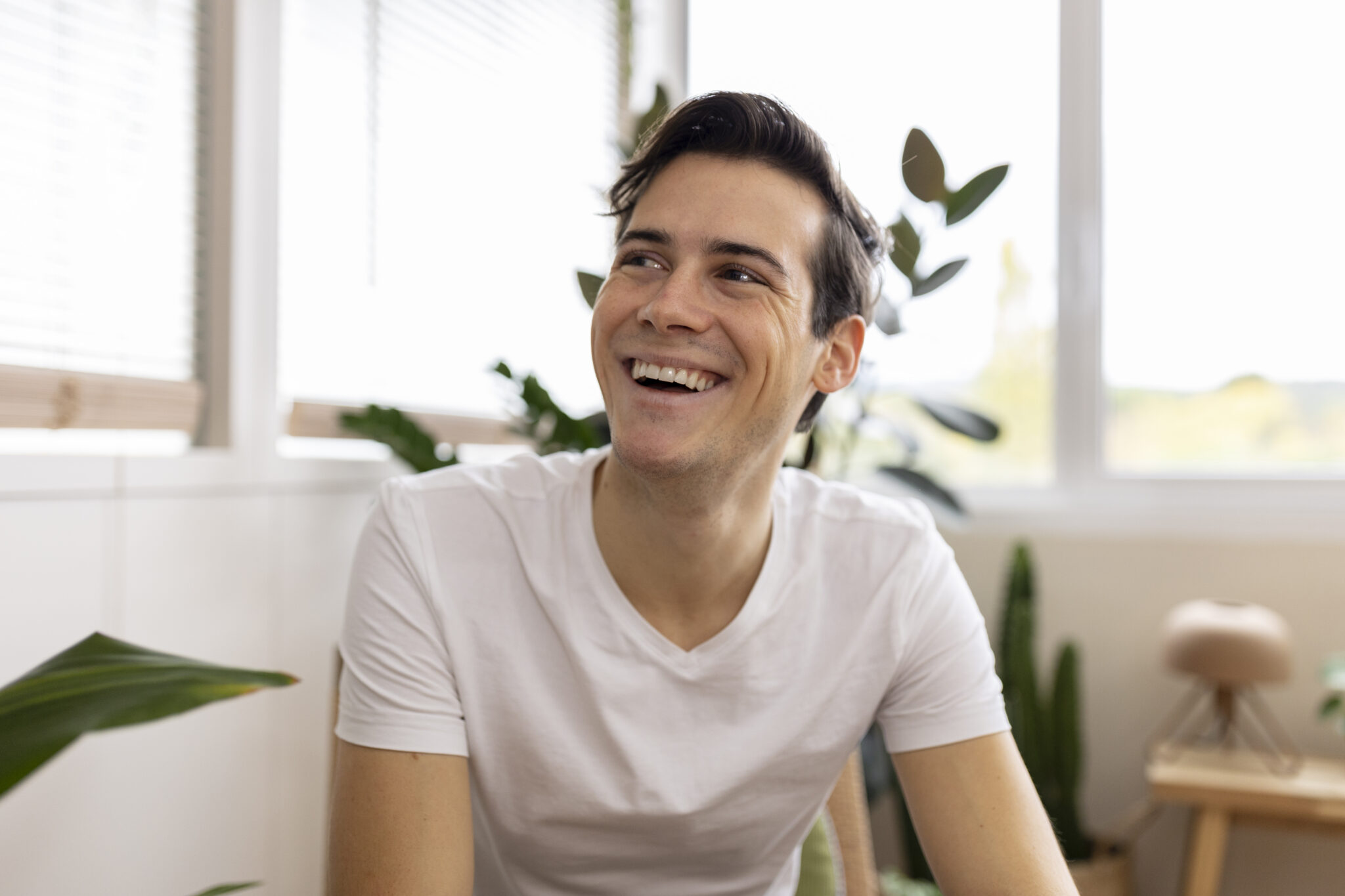 Young Man Smiling While Having Great Time